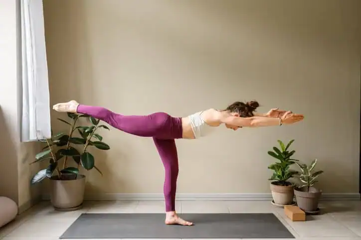 Achieving the Perfect Tone: How Often Should You Exercise for Results? 1 Woman doing Yoga exercise Scottish to help with toning the body.
