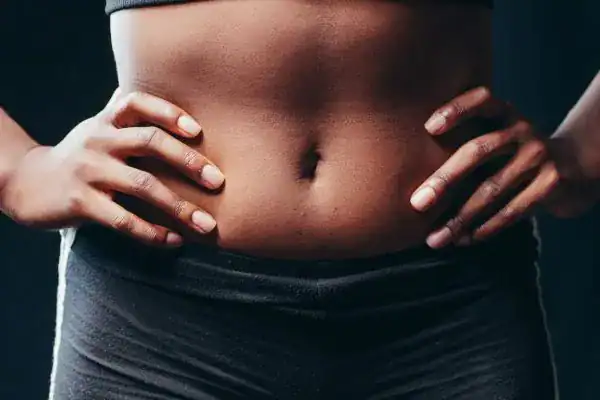 Toning Your Stomach: The Ultimate Guide to Achieving a Sculpted Stomach While Shedding Pounds 1 Image of a toned stomach after non surgical treatment Scottish